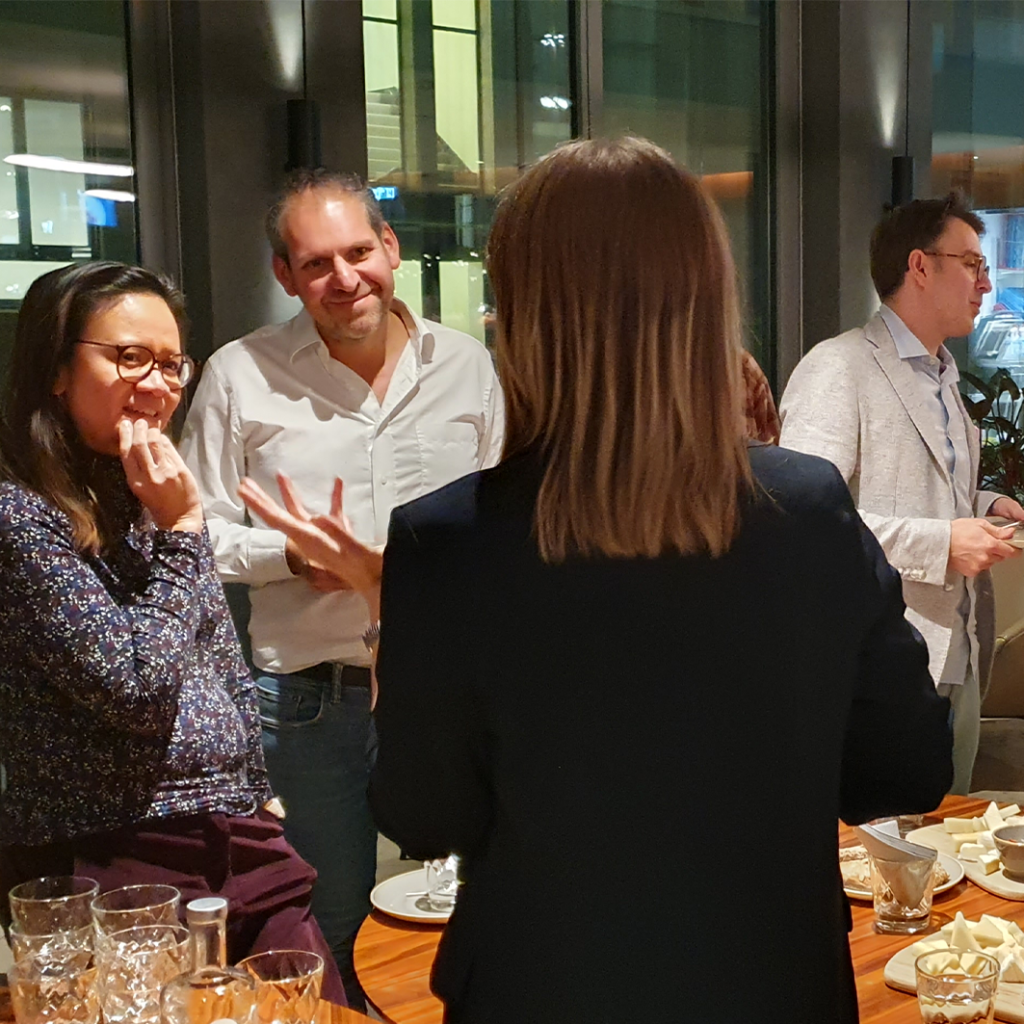 Three decision-makers exchanging ideas at a Deep Networking session in Zurich and Basel